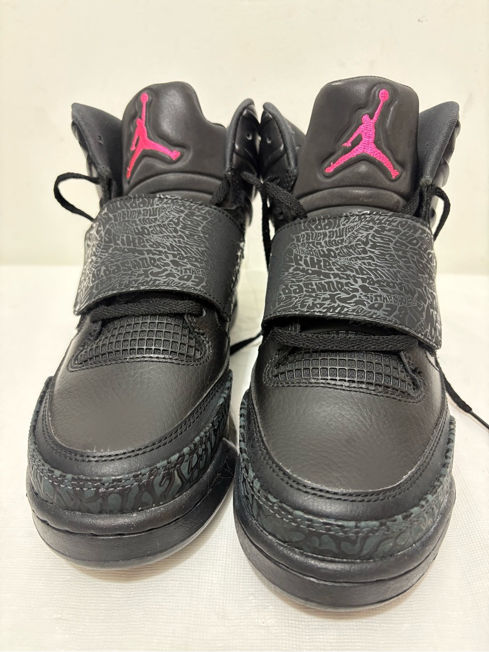 Jordan Kids Black Sneakers with Pink Jumpman Accents